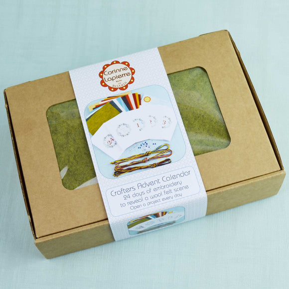 Corinne Lapierre 2018 Crafters Advent Calender. Image of brown craft box with Corinne Lapierre logo and illustrated contents.