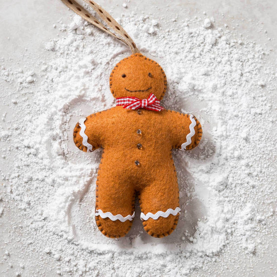 Corinne Lapierre Gingerbread Man Felt Craft Kit. Felt gingerbread man, wearing red & white gingham bow tie.