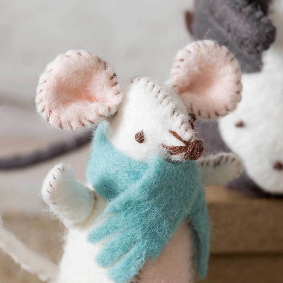 Corinne Lapierre Mouse Family Craft Kit. 4 mice wearing clothing and stood on sewing accessories.