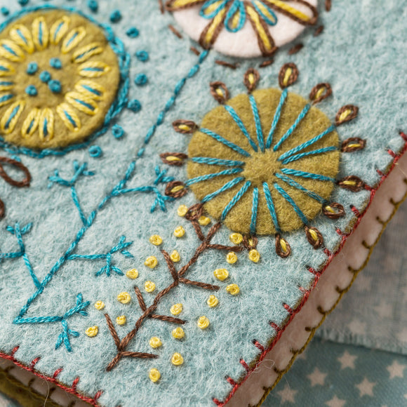 Corinne Lapierre Felt Needle Case Craft Kit. 1 blue felt embroidered rectangular blue needle case. with blanket stich edging.