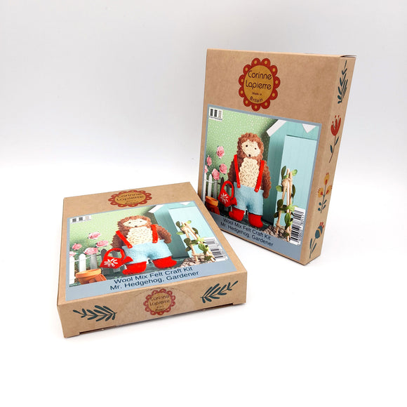 Corinne Lapierre Felt Craft Mini Kit. A folk animal hedgehog stands holding a red watering can.